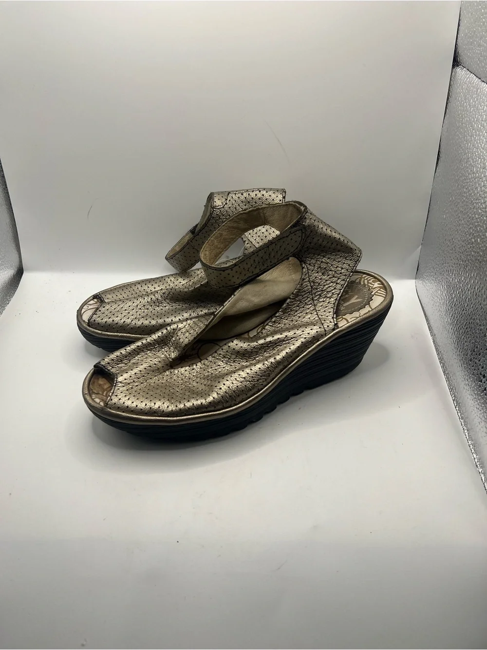 Fly London Metallic Gold Wedge Sandals